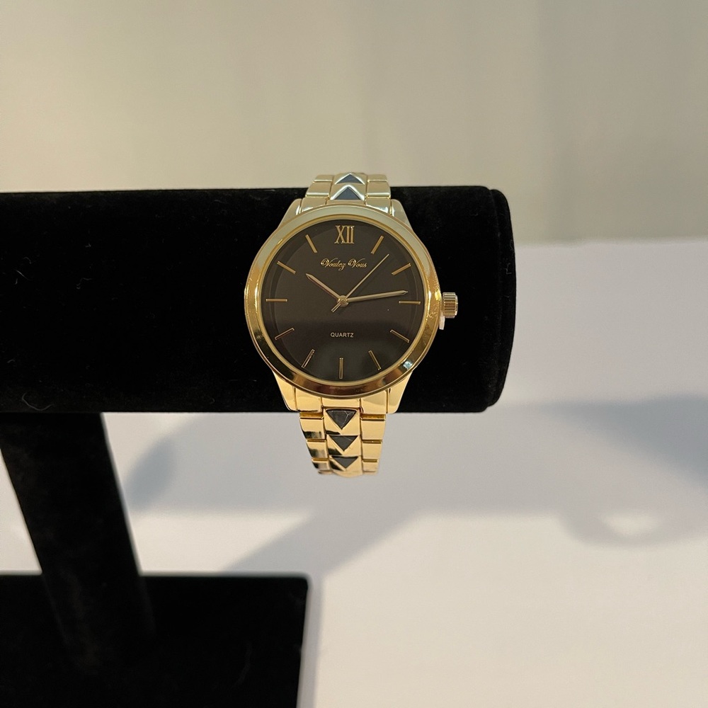 Voulez-Vous Women Stainless Steel Quartz Movement Designer Watch. Black/Gold.